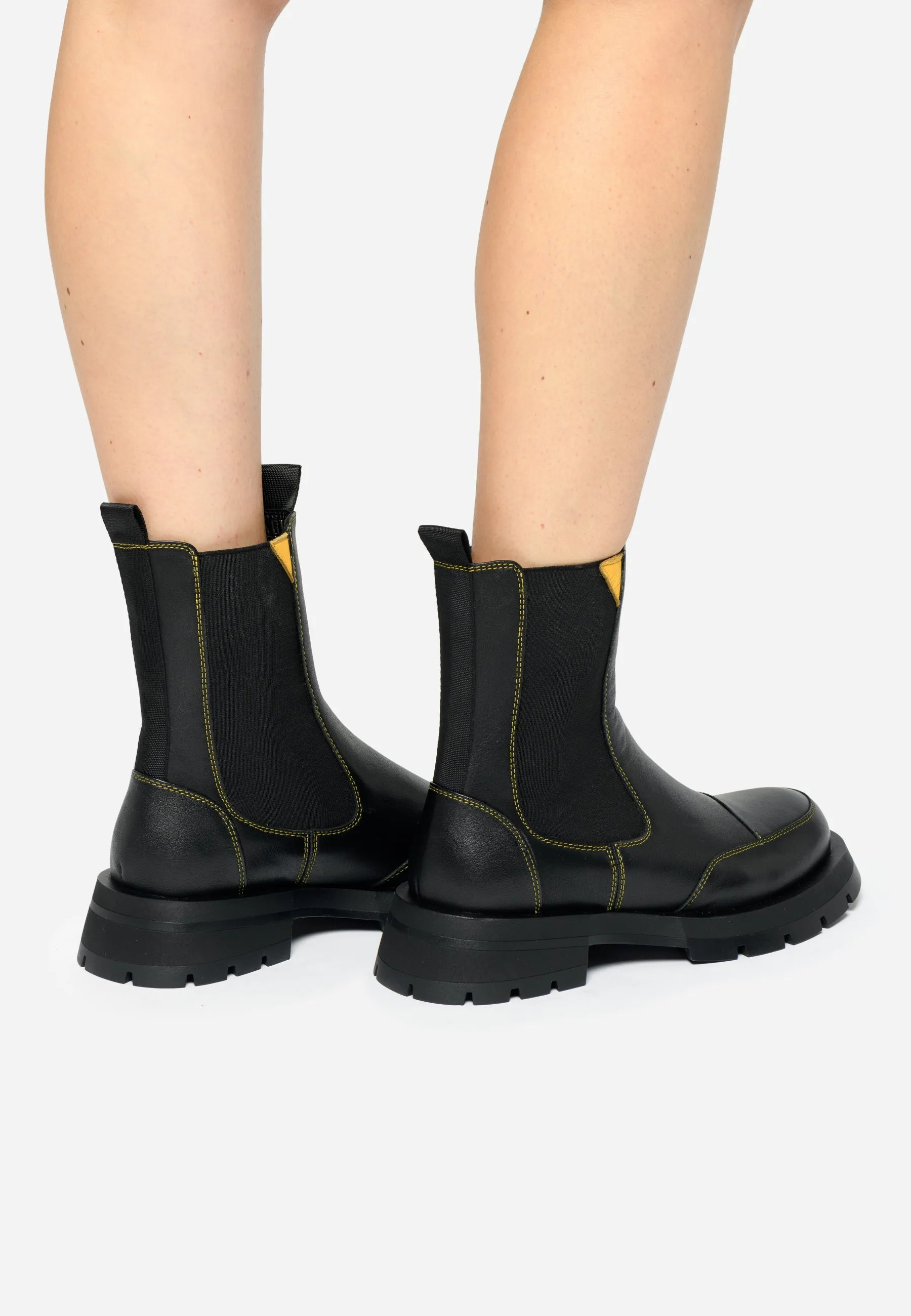 Black Women’s Chelsea Boots with Yellow Stitching - Sleek & Durable