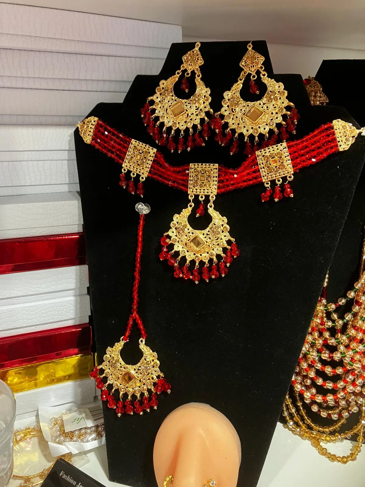 Red guluband choker with earrings and teeka