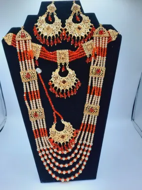 Red guluband choker with earrings and teeka