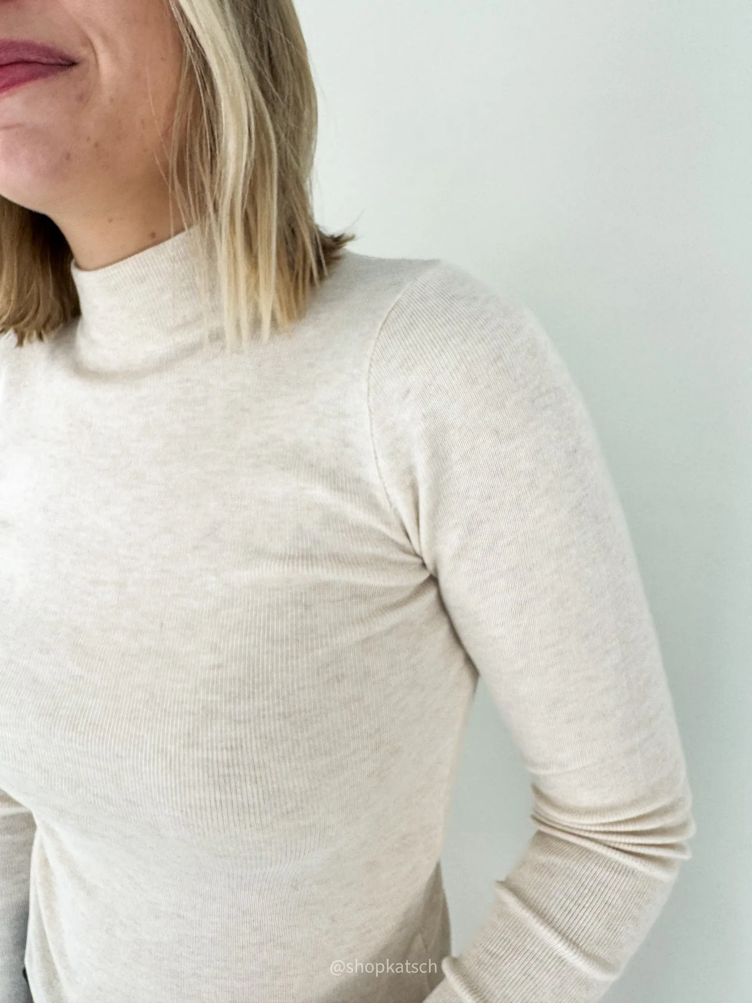 The Lucy Ribbed Mock Neck Sweater